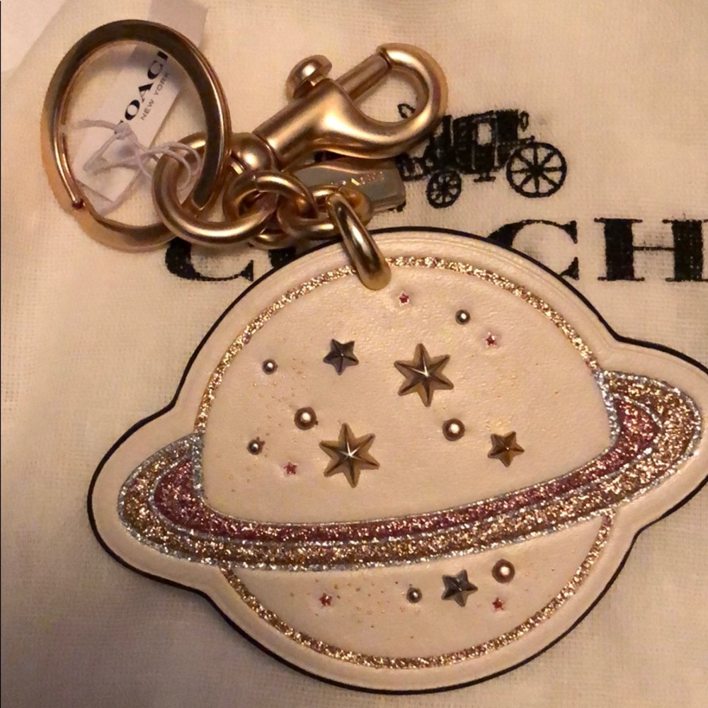 NIB Coach Saturn keyring cream w/ gold decoration